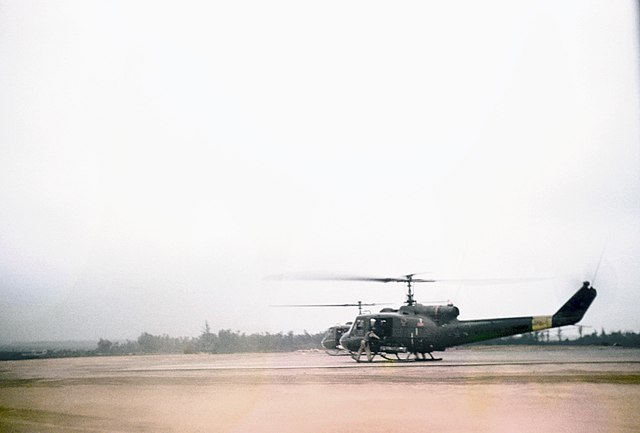 A UH-1E Huey gunship preparing for take off at Đông Hà Combat Base.