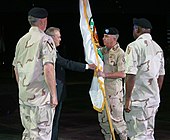 General Abizaid accepts the CENTCOM command guidon from Defense Secretary Donald Rumsfeld on July 7, 2003. US Navy 030707-N-5891B-009 U.S. Army Gen. John P. Abizaid accepts the command flag from the Honorable Donald Rumsfeld, Secretary of Defense, during the U.S. Central Command (CENTCOM) change of command ceremony.jpg