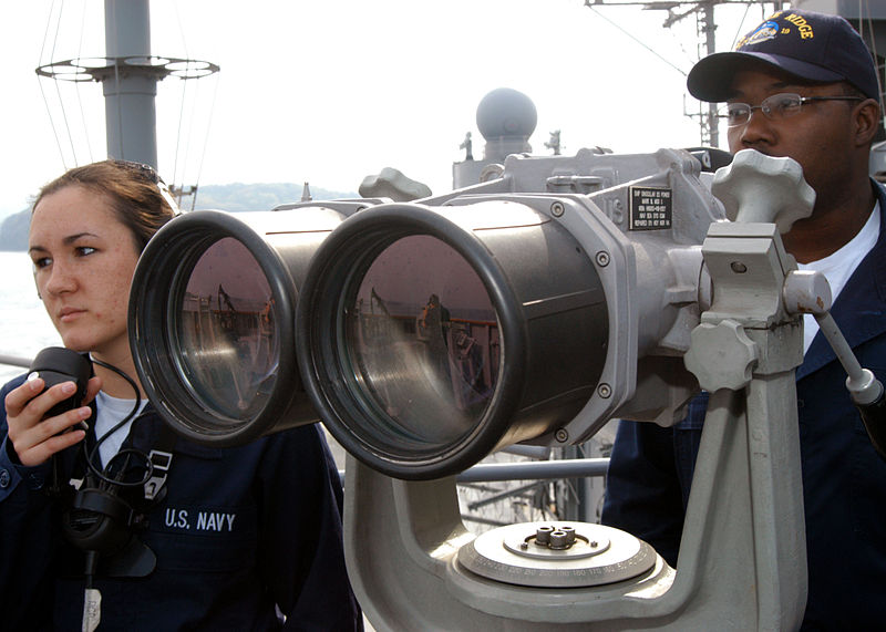 File:US Navy 050419-N-7526R-060 Cryptologic Technician 1st Class Jasen Williams, right, mans the Big Eyes binoculars as Operations Specialist Seaman Stephani Wood stands by, waiting to pass along any instructions as USS Blue Ridge (.jpg