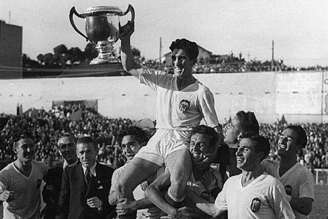 Players of Valencia celebrating after having won the 1941 Copa del Rey final