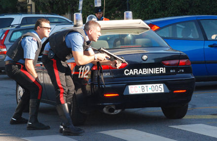 Carabinieri officers armed with a Beretta PM-12 submachine gun