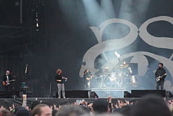 Stone Sour performing at Hellfest in 2013. From left to right: Josh Rand, Corey Taylor, Johny Chow, Roy Mayorga and Jim Root.