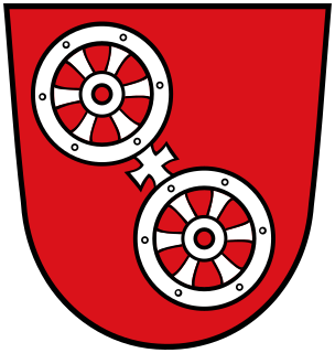 The Wheel of Mainz or Mainzer Rad, in German, was the coat of arms of the Archbishopric of Mainz and thus also of the Electorate of Mainz (Kurmainz), in Rhineland-Palatinate, Germany. It consists of a silver wheel with six spokes on a red background. The wheel can also be found in stonemasons' carvings and similar objects. Currently, the City of Mainz uses a double wheel connected by a silver cross.