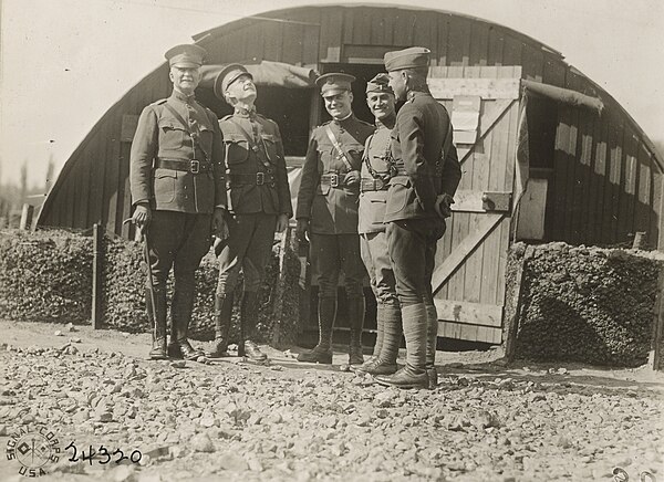 Brigadier General Lawrence D. Tyson, commanding the 59th Brigade, 30th Division, pictured here with a group of staff officers near Poperinge, six kilo