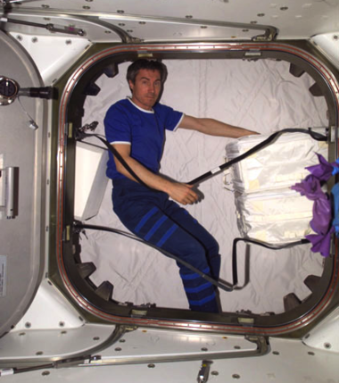 Expedition 11 commander Sergei K. Krikalev inside the Z1 truss dome.