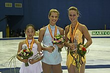 Bereswill (center) with the other medalists at the 2008-09 Junior Grand Prix Final. 2008-2009 JGPF Ladies Podium.jpg