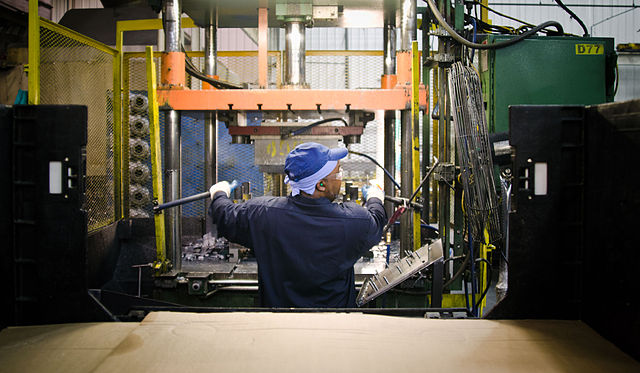 Laborer at work in a factory