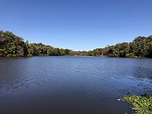 Etra Lake 2023-10-11 14 22 50 View north-northeast across Etra Lake from the parking area along Mercer County Route 571 (Etra Road) in East Windsor Township, Mercer County, New Jersey.jpg