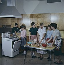 Home economics class in Ottawa, Canada, 1959 A Canadian home economics class learning cooking skills.jpg