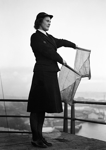 File:A Women's Royal Naval Service signaller with signal flags, 1940. A1699.jpg