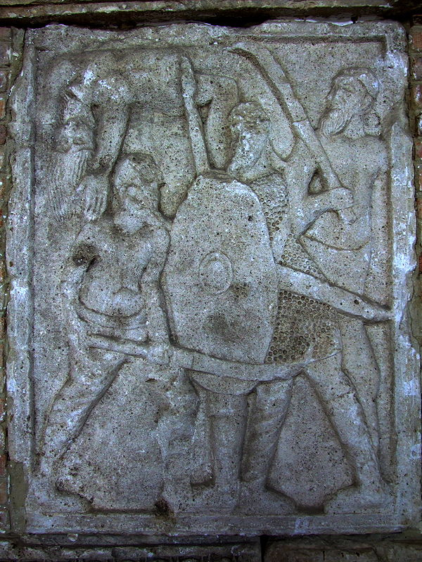 Roman monument commemorating the Battle of Adamclisi clearly shows two giant Dacian warriors wielding a two-handed falx