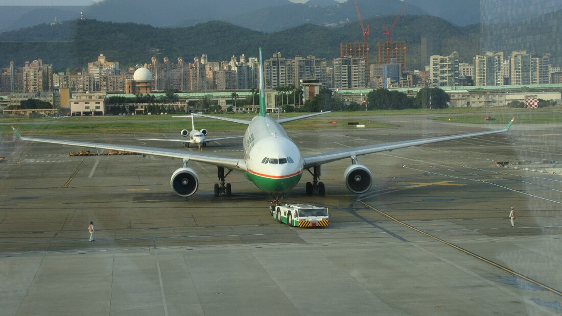 File:Airbus A330 being towed at Songshan Airport.jpg