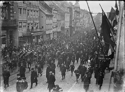 An army band leads New Zealand troops through a city on the Rhine after the Armistice (21651574172).jpg