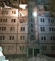 Apartment block in Kharkiv damaged during Russian invasion.jpg