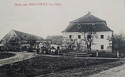 Dům ev. č. 1 na pohlednici z roku 1908