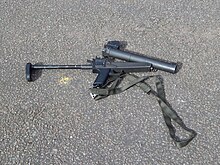 West Midlands Police-issue L104 baton gun with L18 sight Baton gun belonging to West Midlands Police (2).JPG