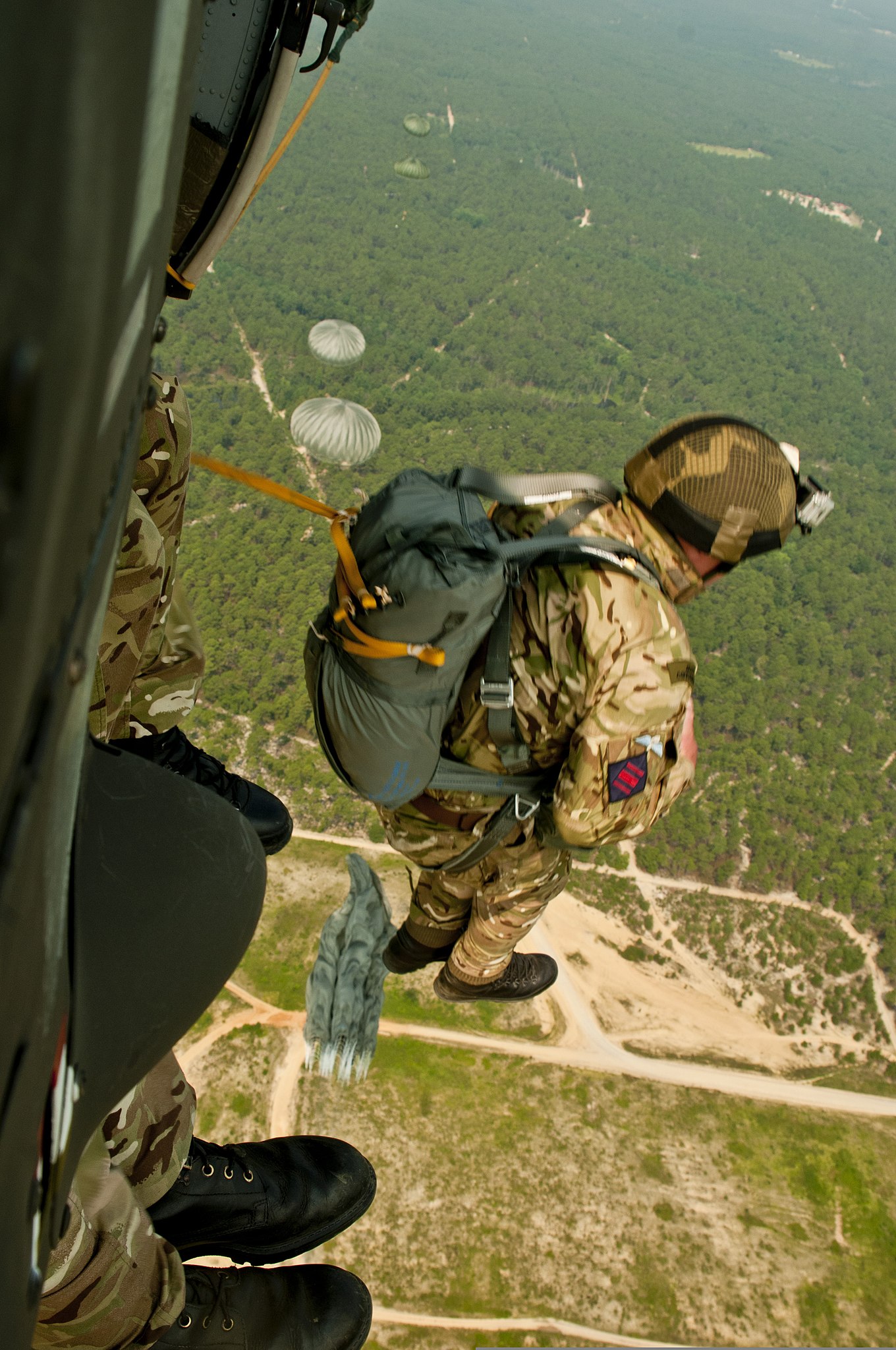 File:British Army Cpl. Ian Chapman, a paratrooper with 4th Battalion, The  Parachute Regiment, exits a UH-60 Black Hawk helicopter during Operation  Black Warrier above the Luzon Drop Zone at Fort Bragg, N.C.