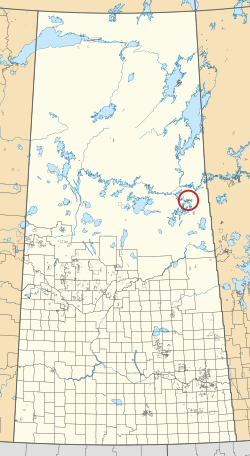 Saskatchewan vilayetinin 297 kırsal belediyesini ve yüzlerce küçük Kızılderili rezervini gösteren bir haritası. Biri kırmızı bir daire ile vurgulanmıştır.