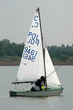 Cadet - competition class, usual step in training of young sailors in sailing of a two-person boat with full complement of sails - mainsail, jib, spinnaker. This class has World Championships organized (junior level only) Cadet Dinghy 9461.jpg