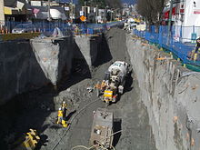 Cut-and-cover construction on Cambie Street, north of 25th Avenue (taken in February 2007). Canada Line Construction, Vancouver, Cambie Street at 25th.jpg