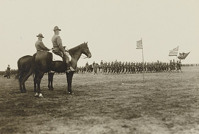 Major General Chase Wilmot Kennedy and Brigadier General Penn reviewing troops at Camp Custer, Michigan, May 1918.
