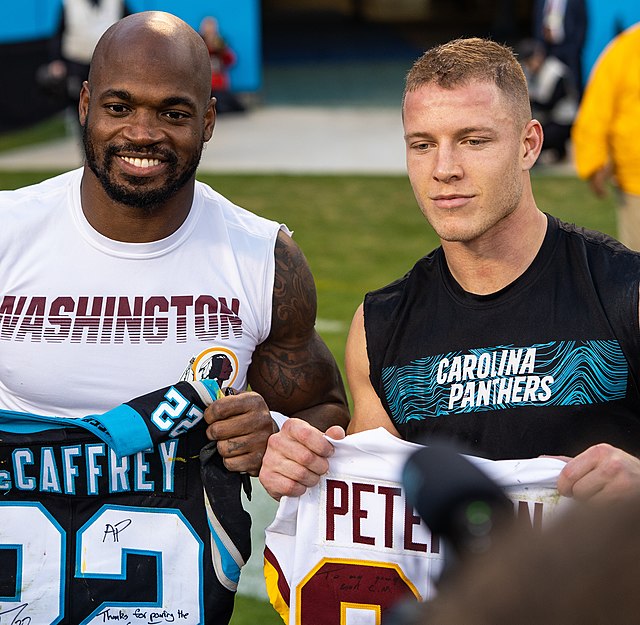 Adrian Peterson and Christian McCaffrey representing an old school and modern running backs styles respectively.