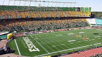 Edmonton's Commonwealth Stadium (shown during player introductions prior to a game) is the largest venue in the CFL. Commonwealth Stadium.jpg