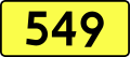 English: Sign of DW 549 with oficial font Drogowskaz and adequate dimensions.