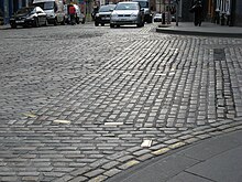 Brass plates mark the outline of the Netherbow Port Edinburgh Town Walls 037.jpg