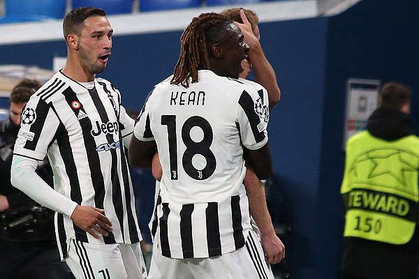 Kean celebrating with his Juventus teammates in 2021