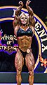 Aleesha Young posing at the 2017 Rising Phoenix World Championships.