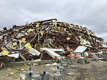 EF3 damage to a large metal-framed warehouse building at the Black River Electric Co-op in Fredericktown, Missouri. Fredericktown EF3 damage.jpg