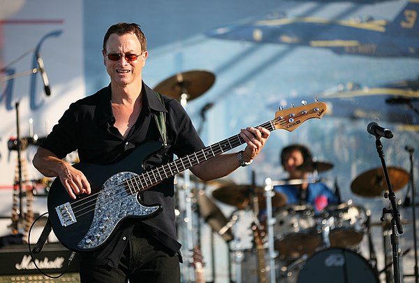 Sinise playing bass guitar in the Lt. Dan Band