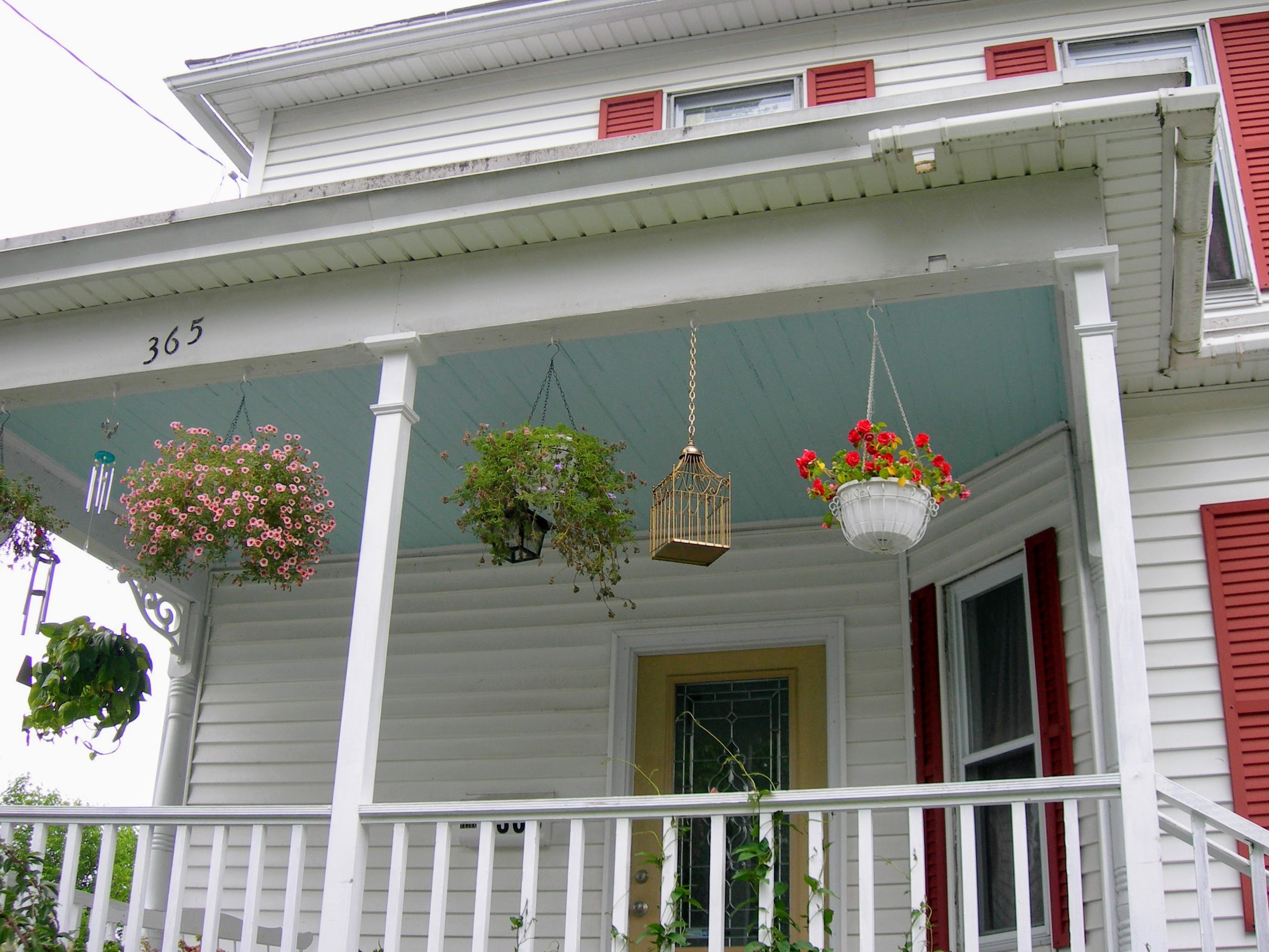 A photograph of Haint Blue paint on the porch of an American house.
