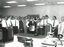 Harry Dornbrand receiving an unofficial award from colleagues at Fairchild Space and Electronics division after the team met the deadline for delivering the proposal for the ATS-6 satellite to NASA, in 1969.