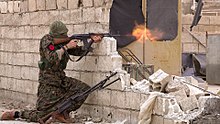 A member of the IRPGF fighting during the Battle of Tabqa. IRPGF fighters in Tabqa 1.jpg