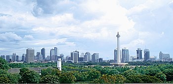 National Monument, the symbol of independence, at the center of Merdeka Square, Jakarta. Jakarta Panorama.jpg