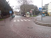 شارع في دارمشتات بألمانيا في العقد الأول من القرن العشرين مرصوف بالأحجار الرصف