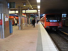 One of the M100 series prototypes, number 106 (right) at Kontula station. Kontulan metroasema.JPG