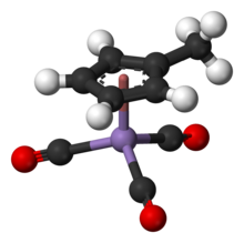 Ball-and-stick model of methylcyclopentadienyl manganese tricarbonyl, a "piano stool" compound MMT-3D-balls.png