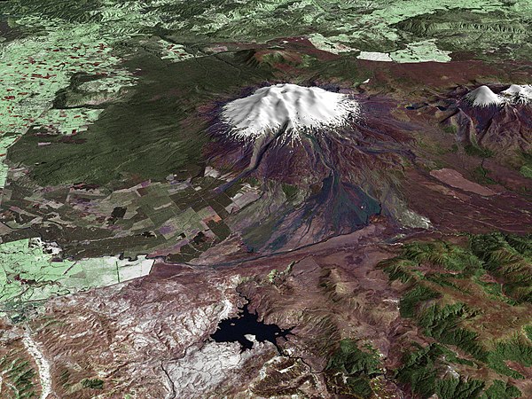 A composite satellite image looking west across Ruapehu, with the older eroded volcano Hauhungatahi visible behind it, and the cone of Ngauruhoe visib