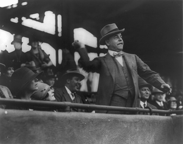 Speaker Longworth throws out the first ball at the starting Congressional Baseball Game between the Democratic and Republican teams of the House of Re