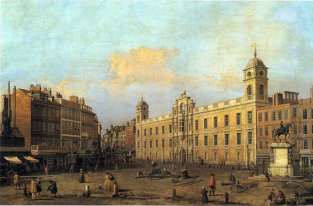 The Strand front of Northumberland House in 1752 by Canaletto. Note the Percy Lion atop the central facade. The Statue of Charles I at right survives 
