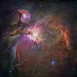 Die hele Orion-newel in sigbare en infrarooilig.Bron: Nasa/ESA