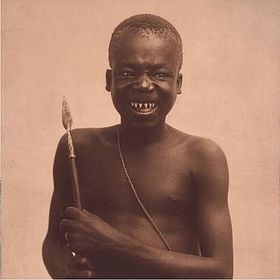 Ota Benga, sharpened teeth and spear.jpg
