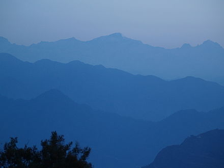 Pauri at dawn, Himalayas as the last upper ridge in the background