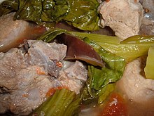 Sinigang, a popular Filipino stew originating from the Tagalogs, is commonly served in many variations throughout the country. Pork sinigang.JPG