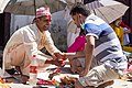 Priest_sacred_bracelet_man_Shrawan_Monday