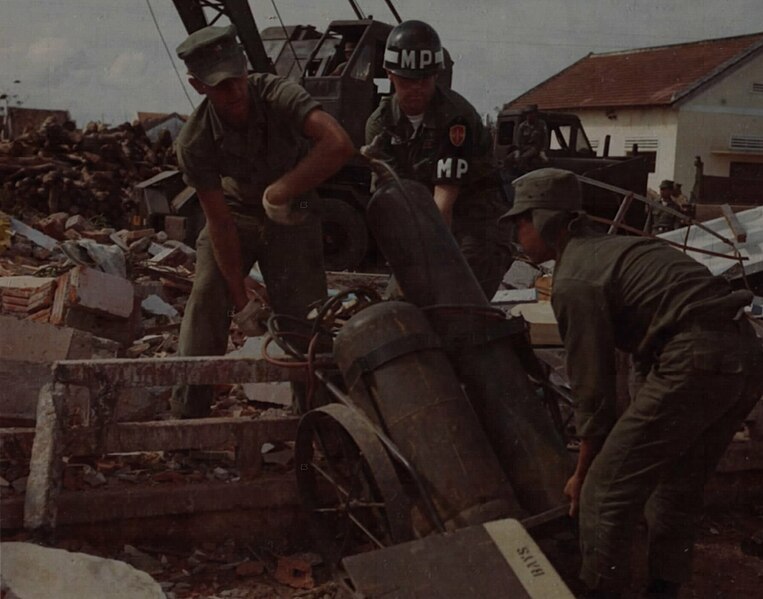 File:Rescue workers at the site of the Qui Nhon barracks bombing.jpg