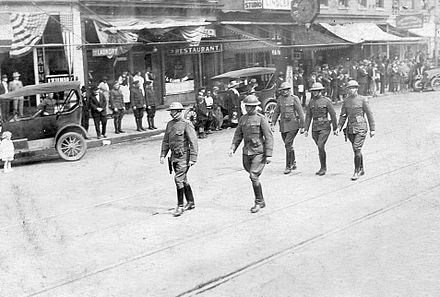 Troops returning from World War I march through Columbia, April 1919